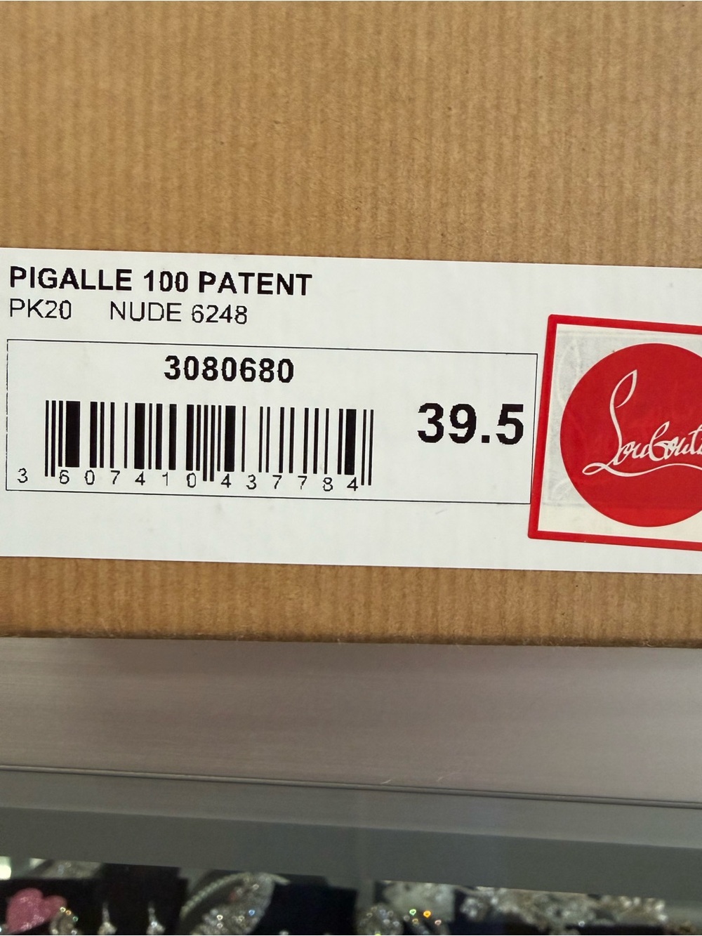 Christian Louboutin Nude Box Label with Red Logo